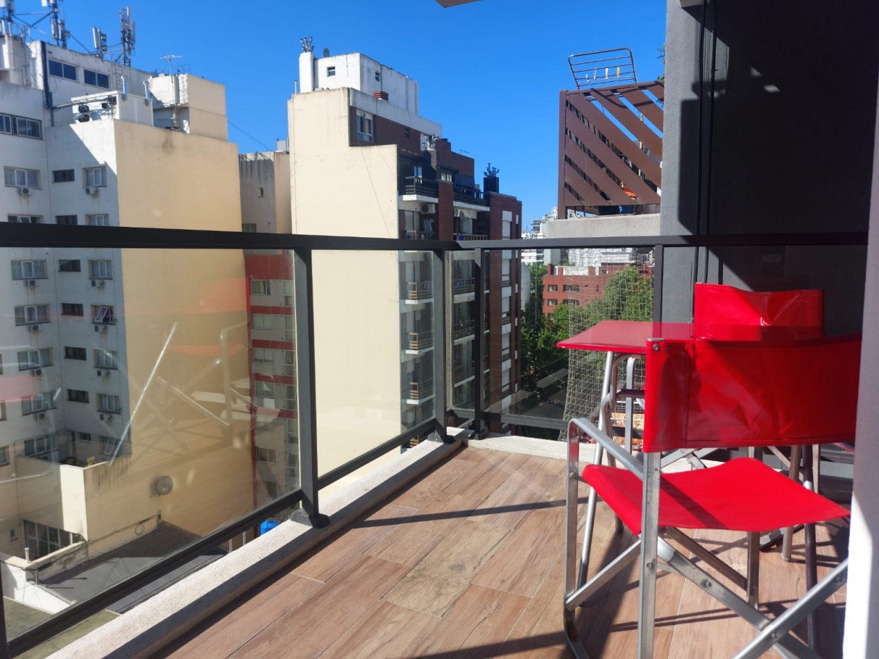 Departamento temporario dos ambientes La Perla con balcon al frente